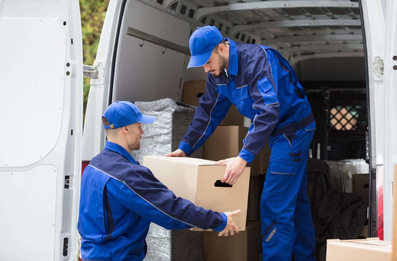 Lifetime Moving Co team providing apartment moving services in Brookline, MA with organized packing and careful furniture protection.